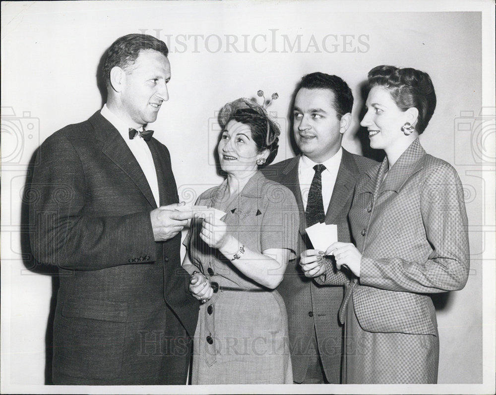 Press Photo Rep. Sidney R. Yates with three others, holding tickets - Historic Images