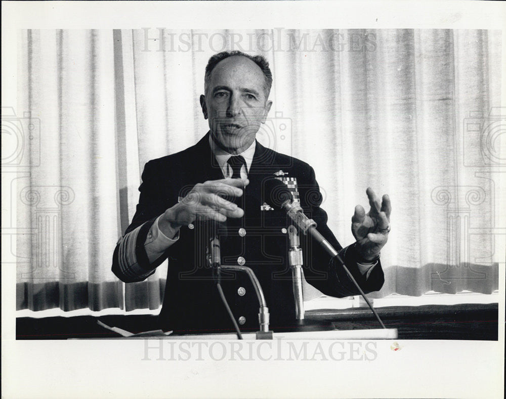 1988 Press Photo Paul A.Yost, Coast Guard Adm. talks to reporter. - Historic Images