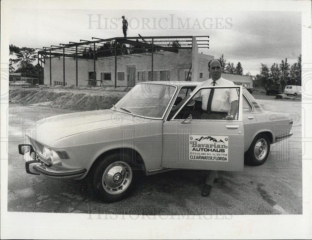 1969 Press Photo James V. Sharp in front of new auto dealership - Historic Images