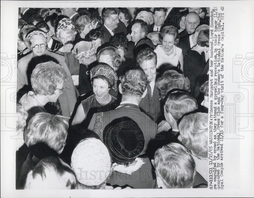 1965 Press Photo Princess Margaret and her husband Lord Snowdon engulfed by a - Historic Images