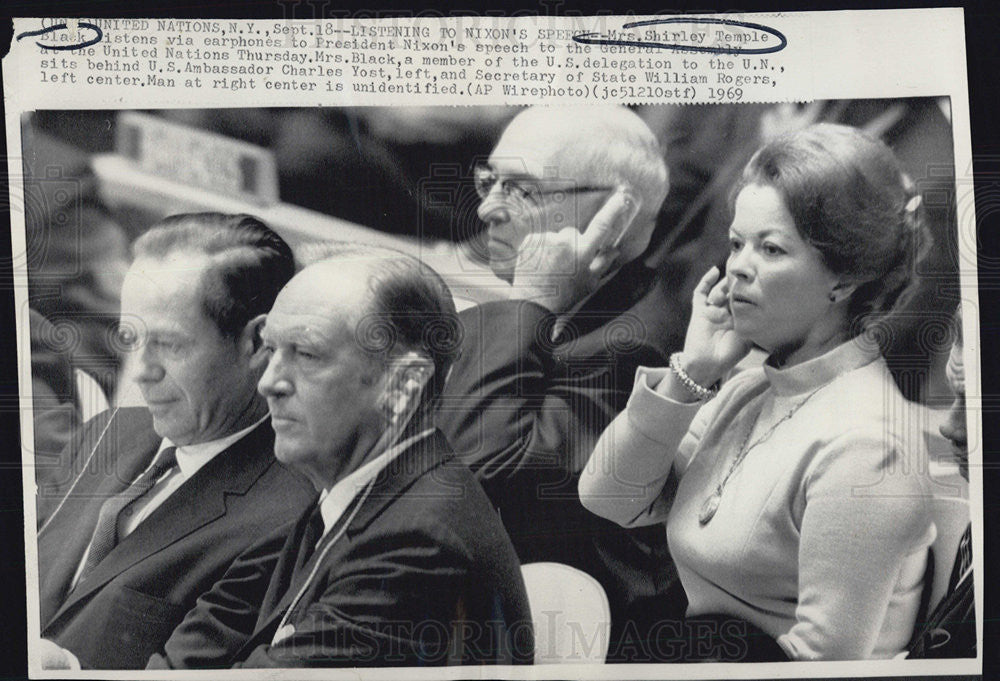 1969 Press Photo Shirley Temple Black,listen via earphone to Pres. Nixon speech. - Historic Images