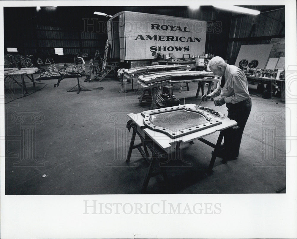 Press Photo Man paint a Theater Props. - Historic Images