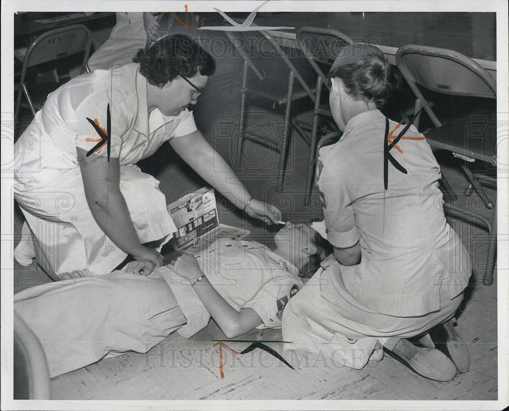 1956 Press Photo Brenda Yogas &amp; Mary Kuzara Practice First Aid National Defense - Historic Images