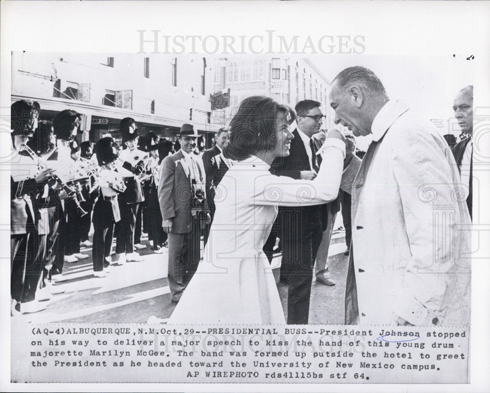 1964 Press Photo President Johnson kisses the hand of Majorette Marilyn McGee - Historic Images