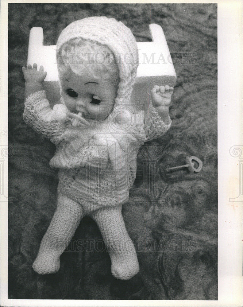 1989 Press Photo Little Doll that can remove passifier Toy. - Historic Images