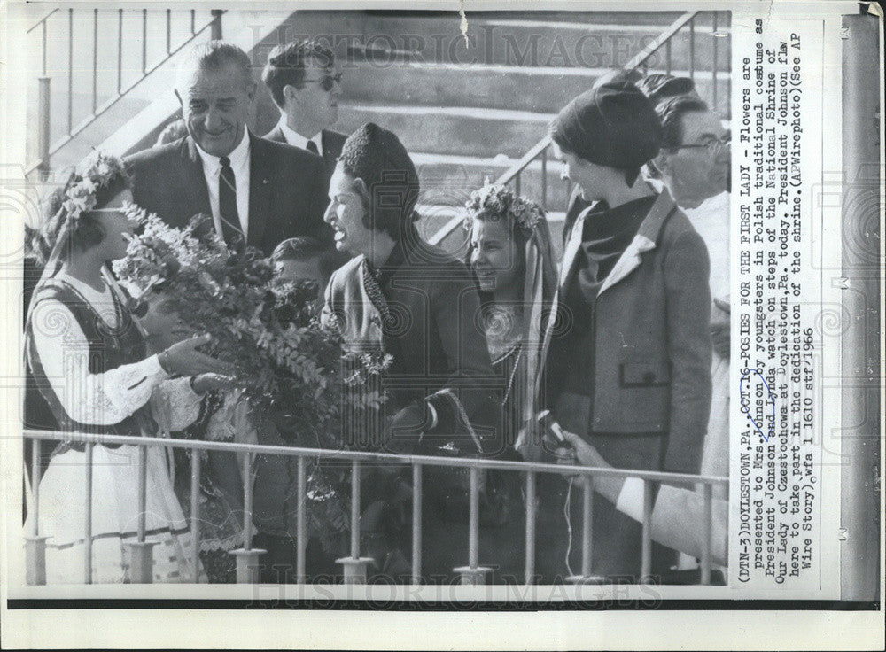 1966 Press Photo Flowers presented by Mrs.Johnson by Polish youngster. - Historic Images