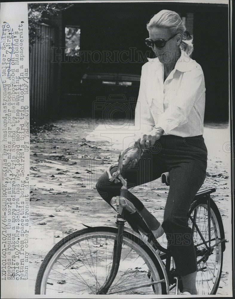 1968 Press Photo Mrs. Jo Schirra rides a bike as her husband Walter Schirra - Historic Images