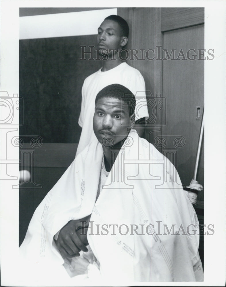Press Photo Derrick Mims basketball player shot in back - Historic Images
