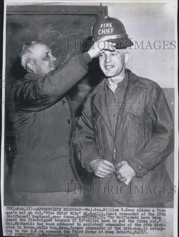 1951 Maj Gen William B,Kean place man hat on &quot;Fire Chief Miko&quot; - Historic Images