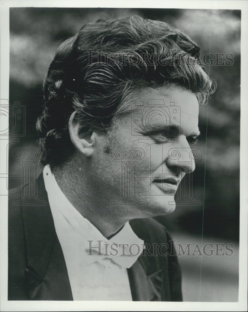 Press Photo Frank Little in black and white suit with hair swept back - Historic Images