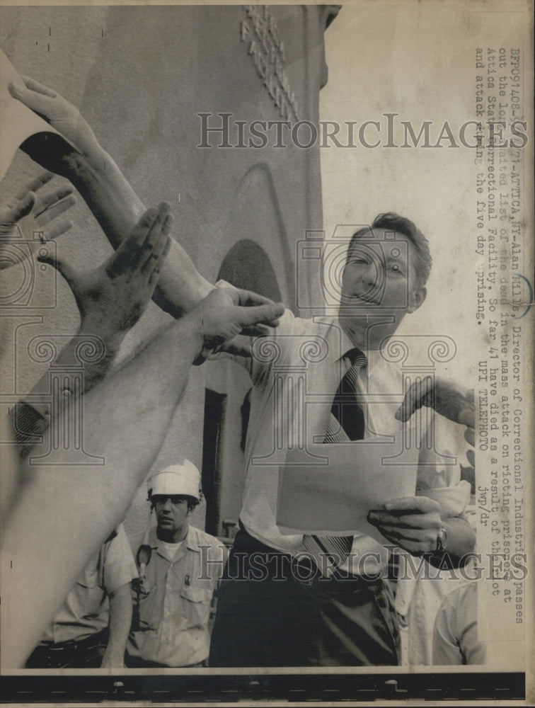 1971 Alan Mills, Dir. of Corr. Industries Hands out List of Casuties - Historic Images