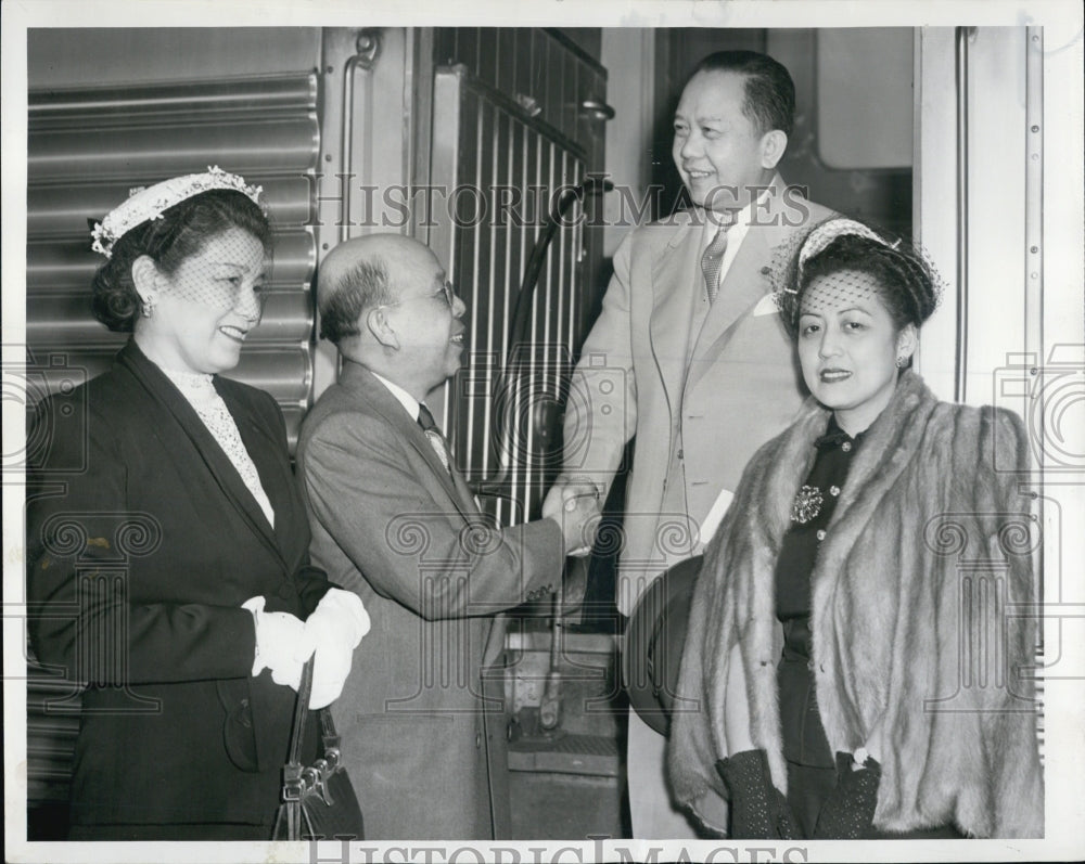 1952 Carlos Romula and his wife meets L T Ruiz and his wife - Historic Images