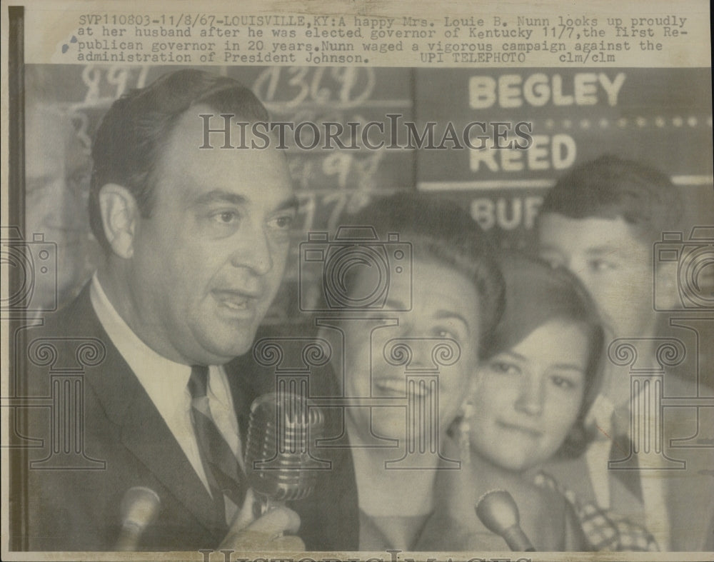 1967 Mrs. LouieB. Nunn looks at husband after he is elected governor - Historic Images