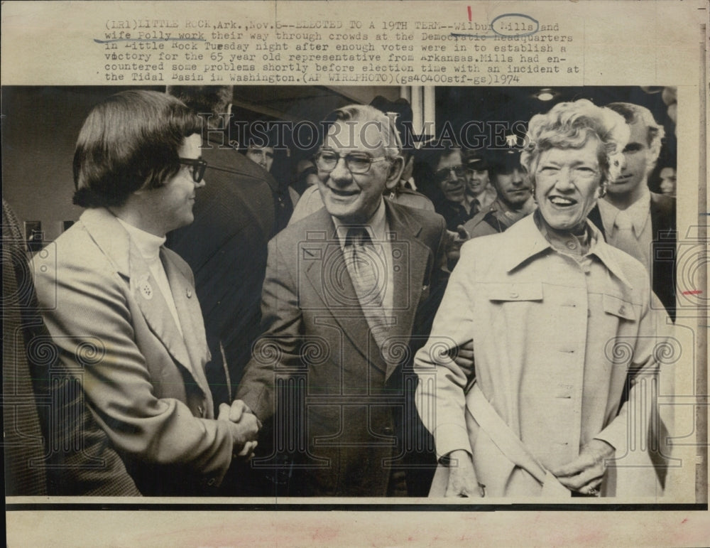 1974 Wilbur Mills and his wife Polly walking through crowds - Historic Images