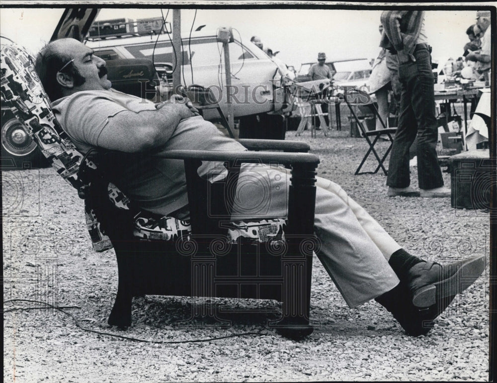 1972 Mike Vallario stayed comfortable in his chair until it sold. - Historic Images