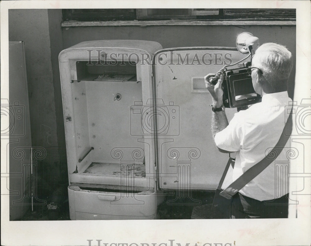 1966 St. Petersburg police arrested owner refrigerator children-Historic Images