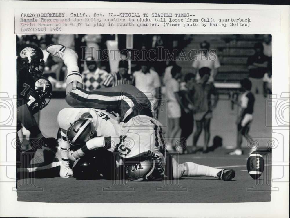 1985 Press Photo Reggie Rogers Joe Kelley Cal quarterback Kevin Brown - Historic Images