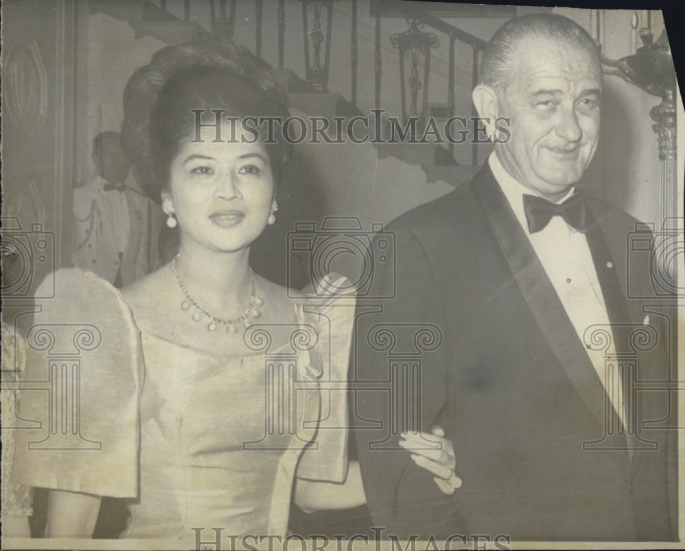 1966 President Johnson escorts Mrs Ferdinand Marcos to state dinner - Historic Images