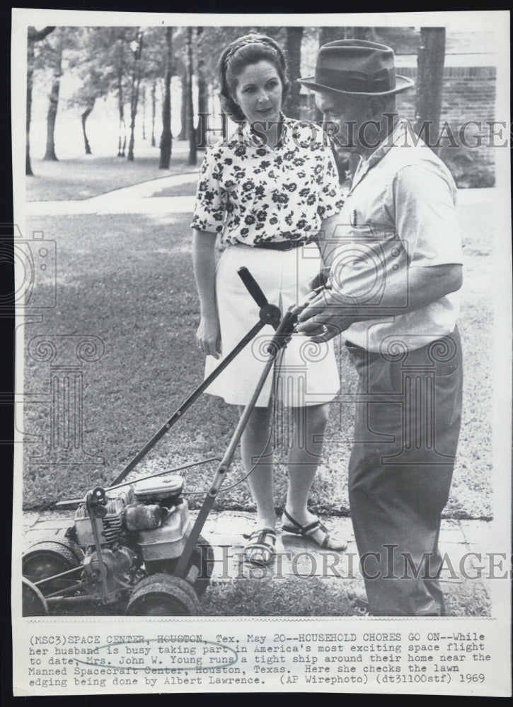 1969 Mrs. John W. Young checks lawns edges Space Center Houston - Historic Images