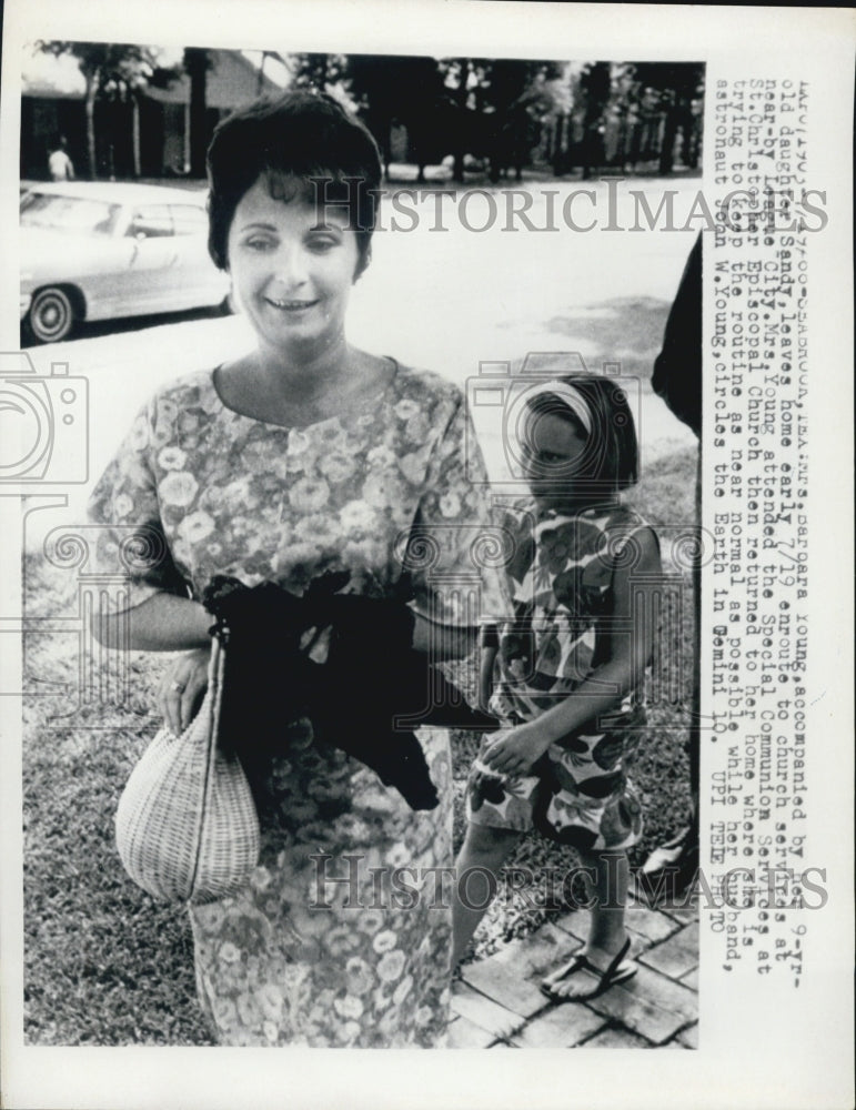 1966 Mrs. Barbara Young enroute to church with children John Young - Historic Images