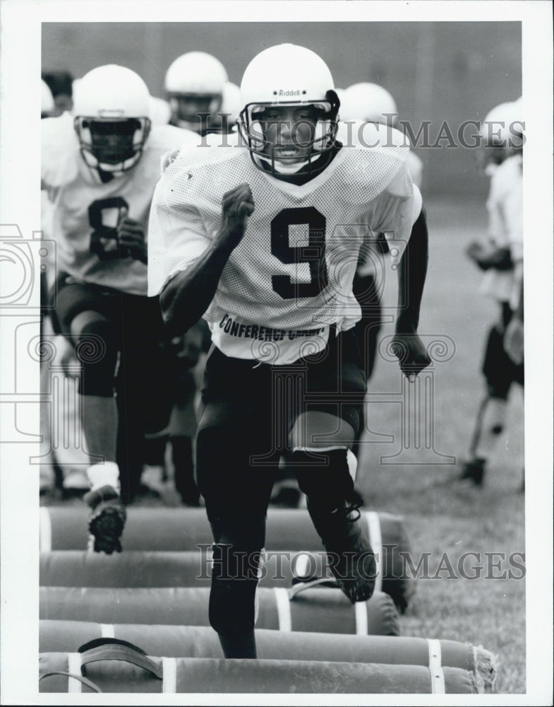 1994 Press Photo Danny Clark runs over tackling dummies Hillcrest High Schools - Historic Images