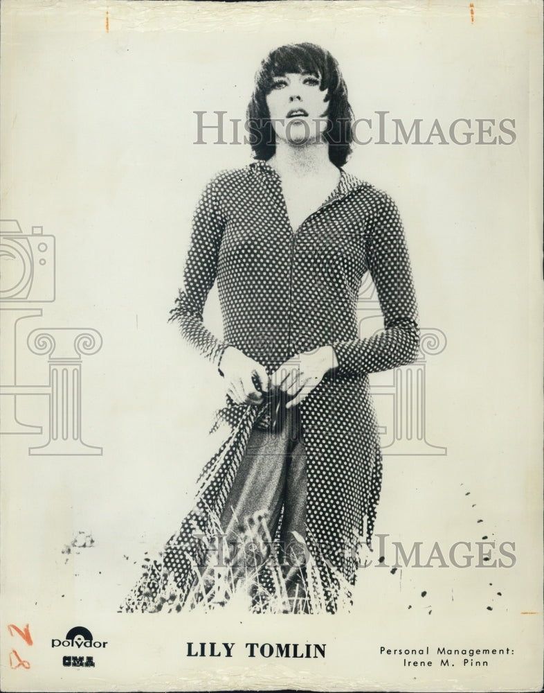 1974 COPY Lily Tomlin In Spotted Dress Waling Through Weeds - Historic Images