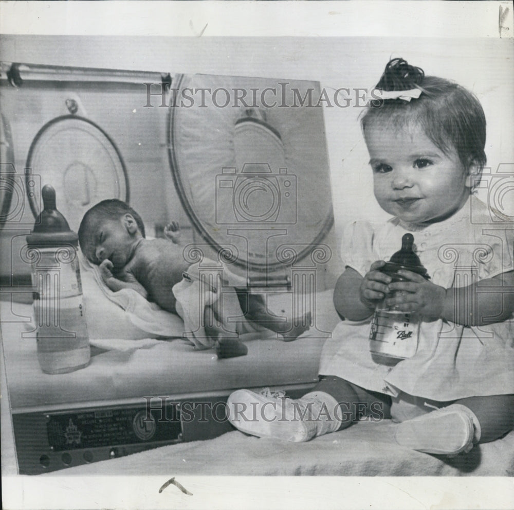 1965 Miracle baby Laurie Ann Mitchell celebrates 1st birthday - Historic Images