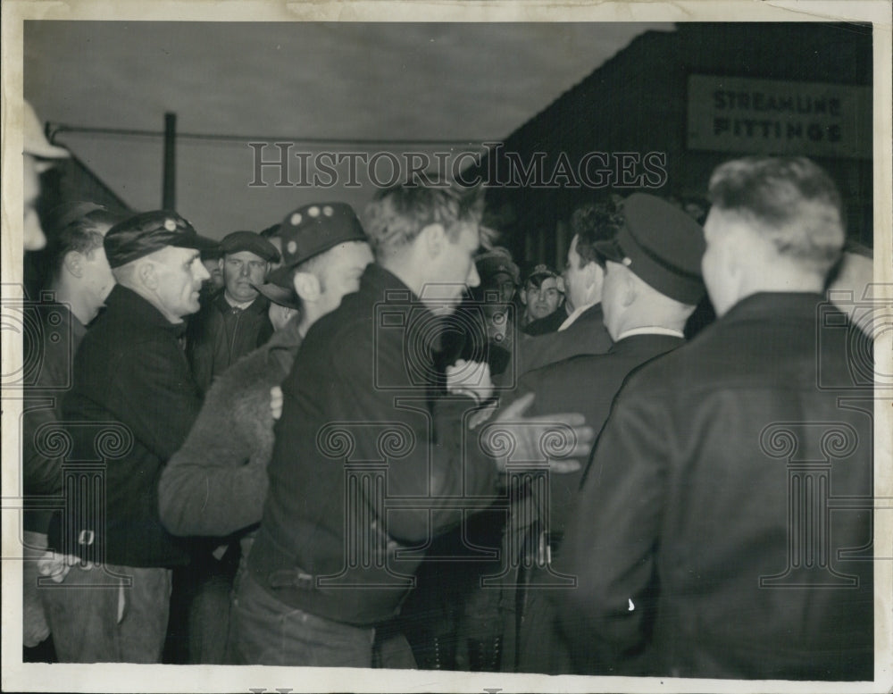 1937 Picketers fighting around the main gate at Mueler Brass. - Historic Images