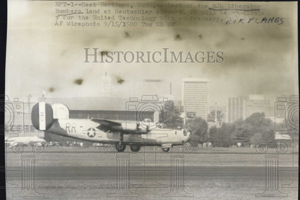 1975 of the last of the B24 Liberator bombers landing at Rentschler - Historic Images