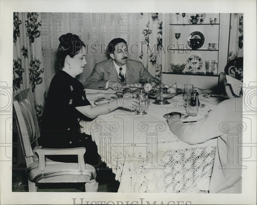 1946 Aleman family having breakfast at table - Historic Images