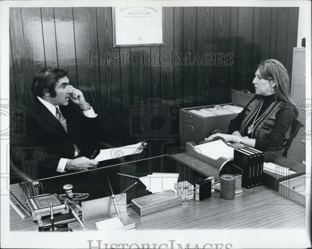 1973 Bob Woolf Sitting At Desk With Lady - Historic Images