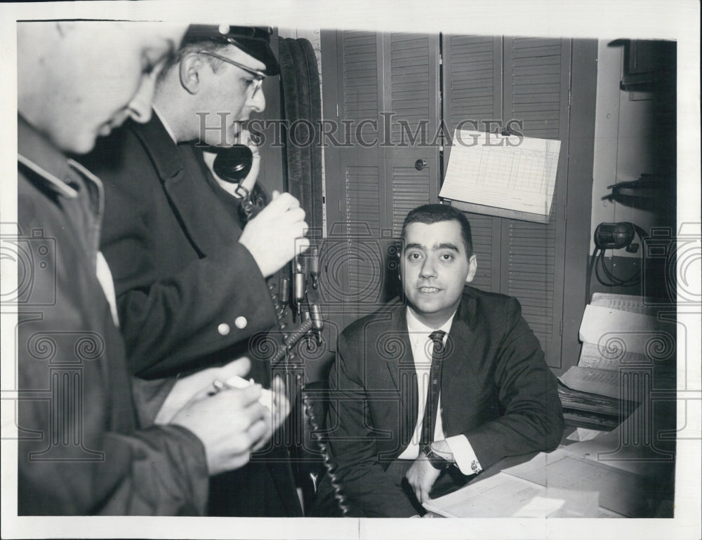 1960 Joseph Olson asst manager of the Woods Theatre tells of robbery - Historic Images