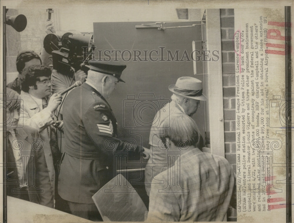 1976  Natl Hockey League President Clarence Campbell in straw hat, - Historic Images