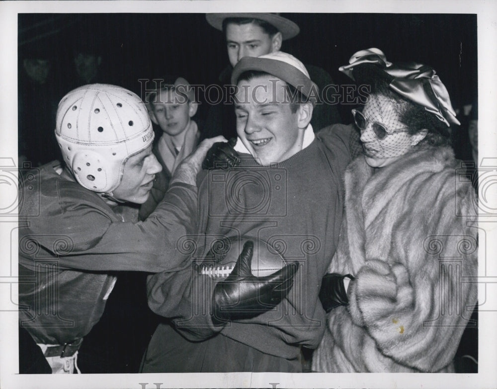 1947 Mrs. Charles Bidwell Widow of the Champ developer gets football - Historic Images