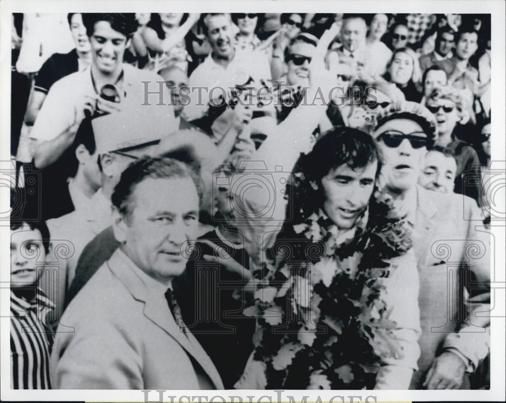 1969 Jacky Stewart acknowleges victory in French Grand Prix - Historic Images