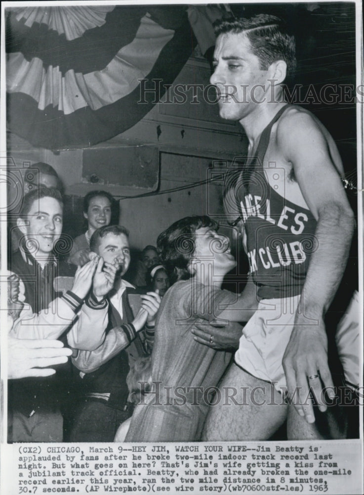 1963 Jim Beatty and his wife, Track star. - Historic Images