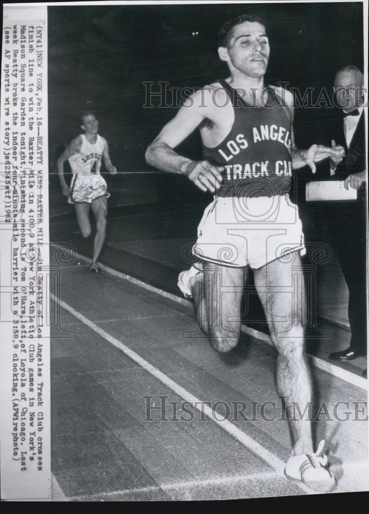 1962 Jim Beatty, track star. - Historic Images