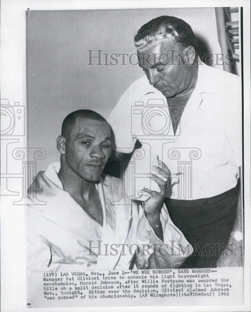 1963 Pat Oliver and Harold Johnson. - Historic Images