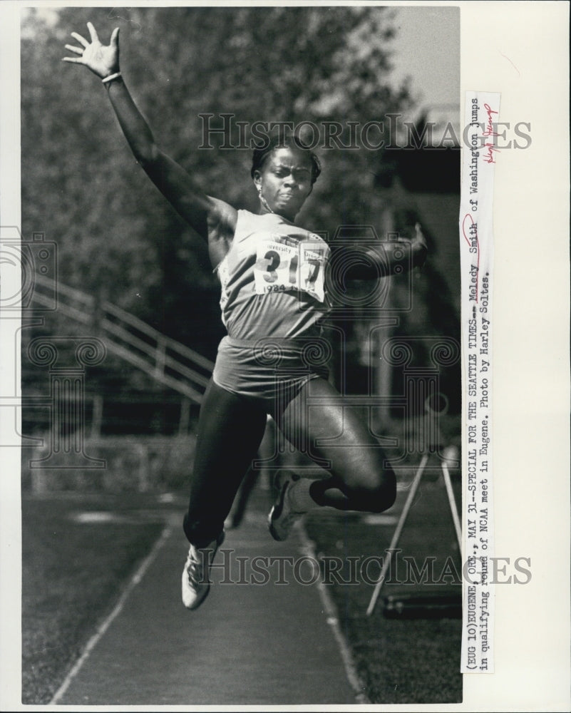 1984 Press Photo College Track Star Melody Smith Takes High Jump At NCAA Meet - Historic Images