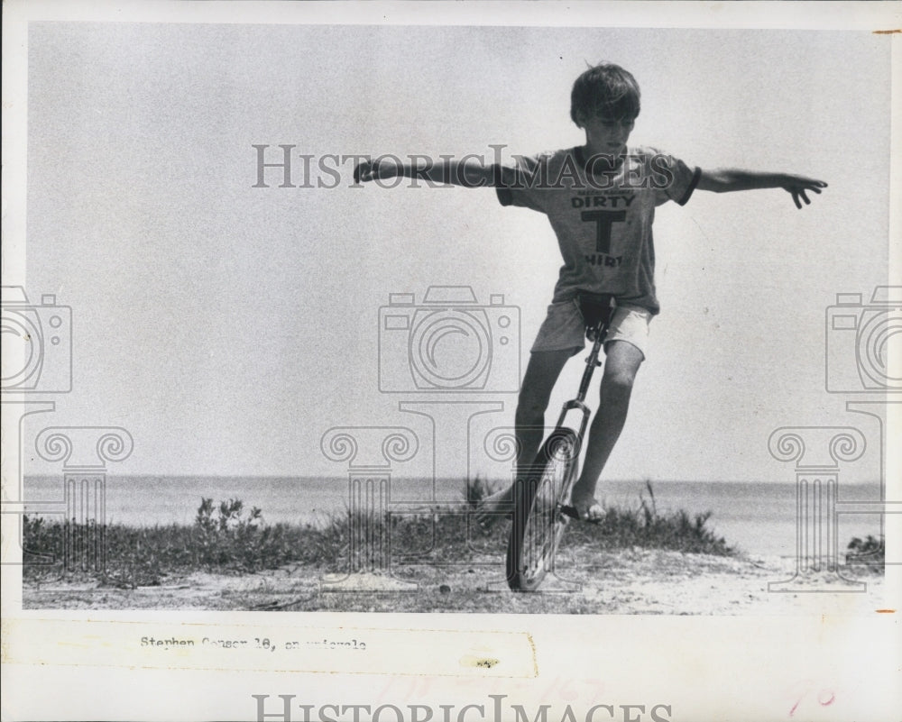 1971 Stephen Conser Rides His Unicycle Beach Front - Historic Images