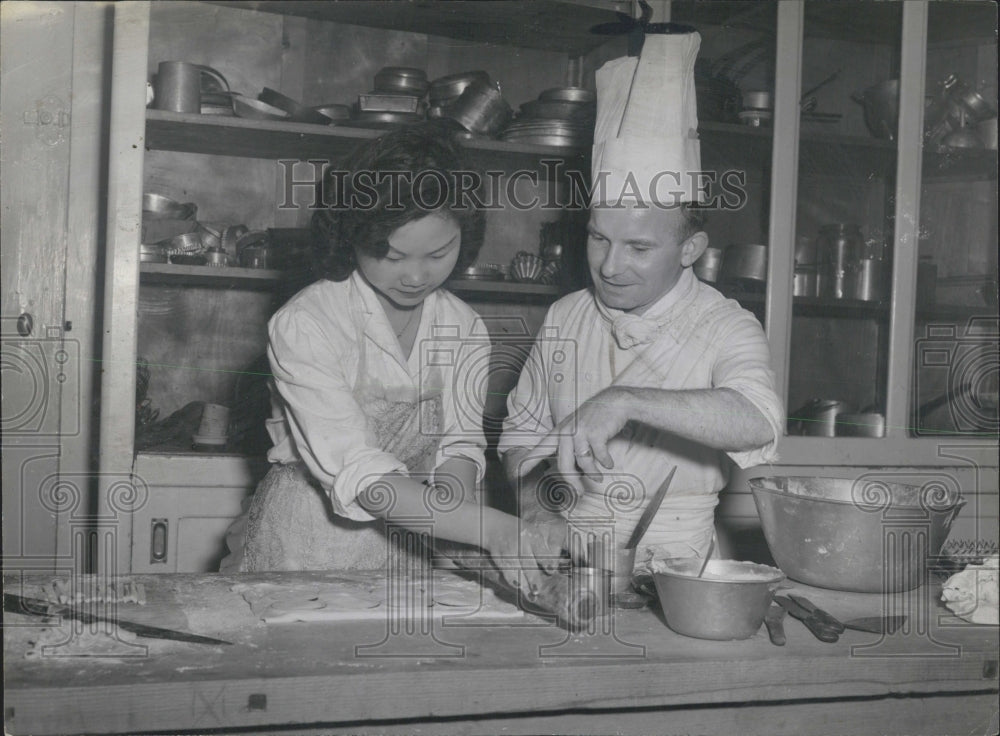 1951 Marie Homi Learning To Make Pastries From Chef Raymond Mary - Historic Images