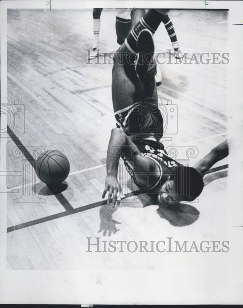 1969 Carl McDonald trying to keep ball in play - Historic Images