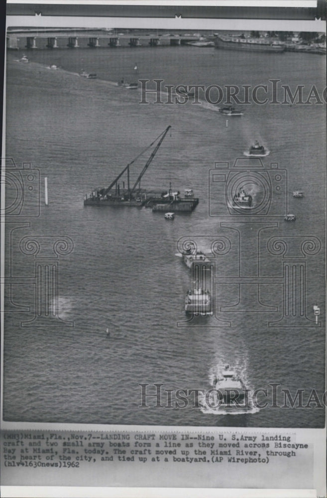 1962 Nine US army landing craft move up the Bay - Historic Images