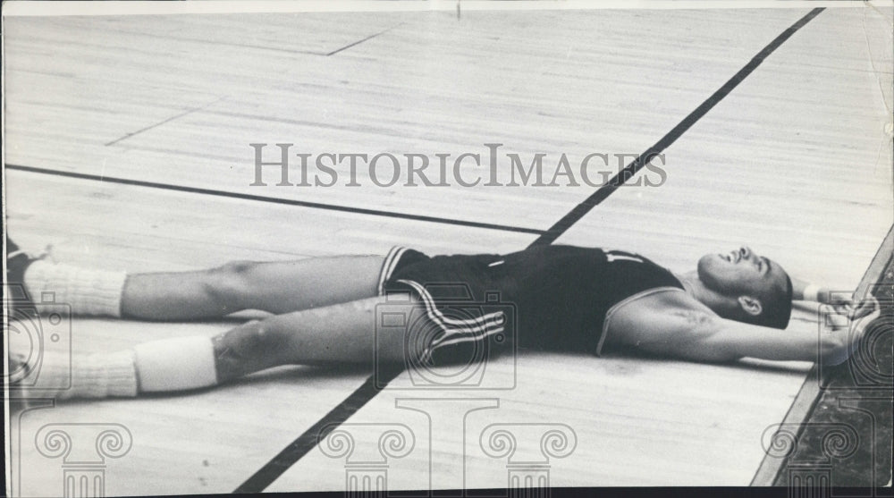 1964 A prone Sam douglas of parker faces skyward in gleeful thanks. - Historic Images
