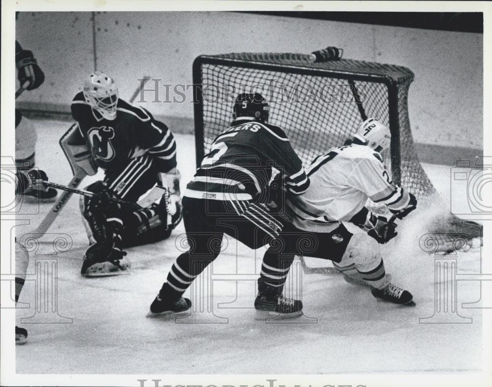 Press Photo Boston Bruins Hockey Player Bob Joyce Makes Goal Against Sean Burke - Historic Images