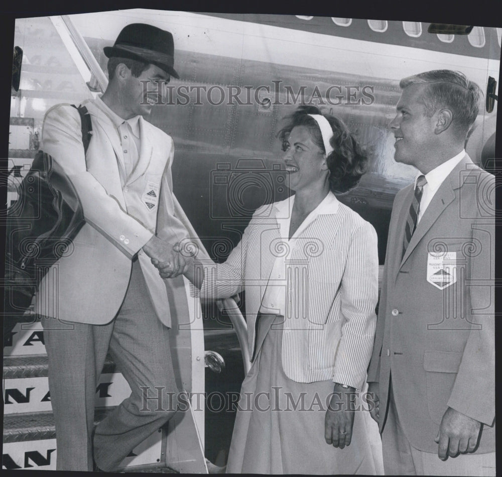 1965 So African golfer Trevol Wilkes gets greeted by Frances Hickey - Historic Images