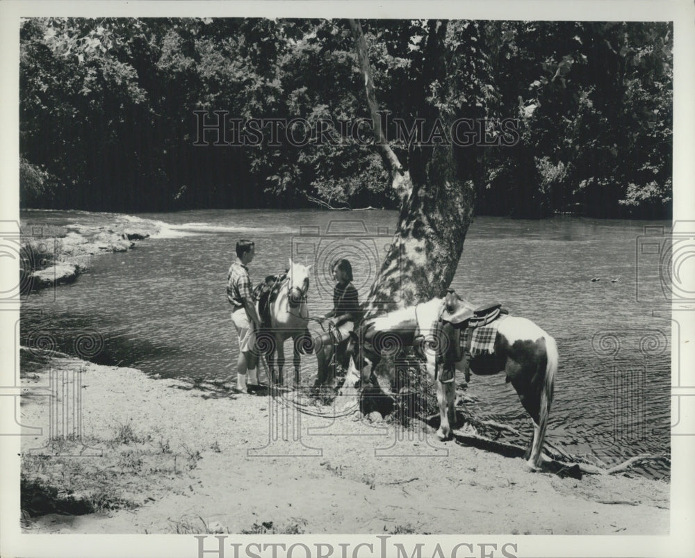 1966 Couple Rests Horses Along The Banks Of Ozarks Frontier Trail AK - Historic Images