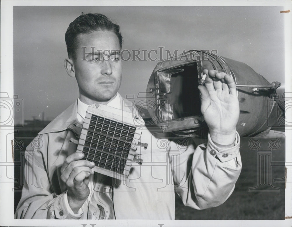 1950 Engr Allan Thompson Holds Simple Features in Helicopter Engine - Historic Images