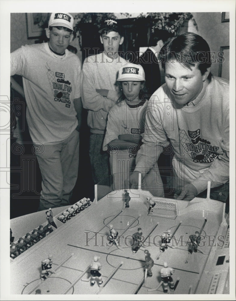 1992 Press Photo Andy Moog Goalie Goaltender Boston Bruins Toy Hockey Game - Historic Images