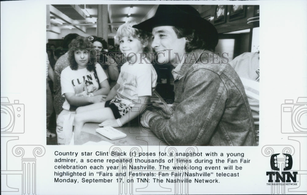 Press Photo Country Star Clint Black (R) poses for a snapshot with young admirer - Historic Images